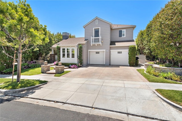 11 Markham Ln, Ladera Ranch, CA 92694 - traditional-style house with driveway, an attached garage, roof with shingles, and a chimney