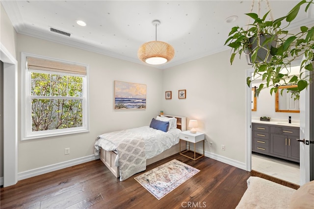 11 Markham Ln, Ladera Ranch, CA 92694 - bedroom featuring baseboards, dark wood finished floors, crown molding, and a sink