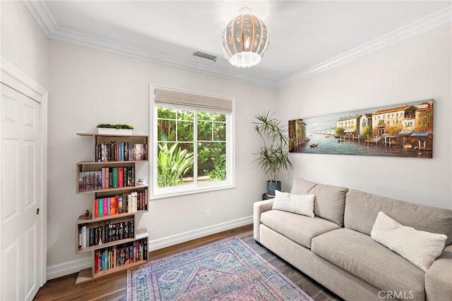 11 Markham Ln, Ladera Ranch, CA 92694 - living area featuring baseboards, ornamental molding, wood finished floors, and a chandelier
