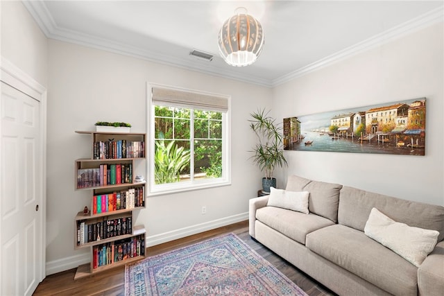 11 Markham Ln, Ladera Ranch, CA 92694 - living room with crown molding, wood finished floors, and a chandelier