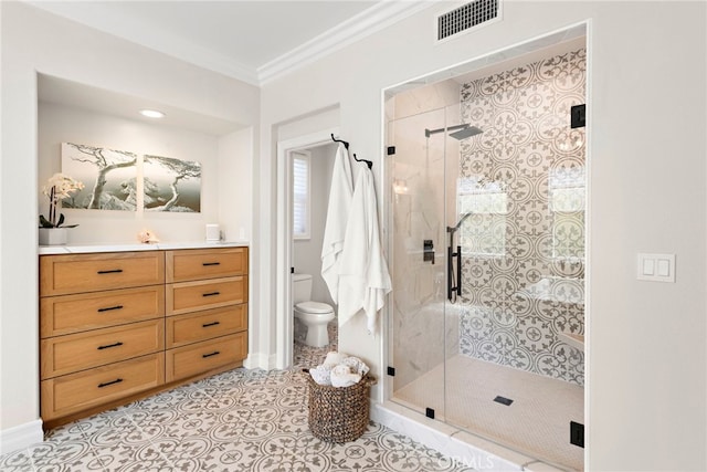 11 Markham Ln, Ladera Ranch, CA 92694 - full bathroom with a shower stall, ornamental molding, toilet, baseboards, and tile patterned floors