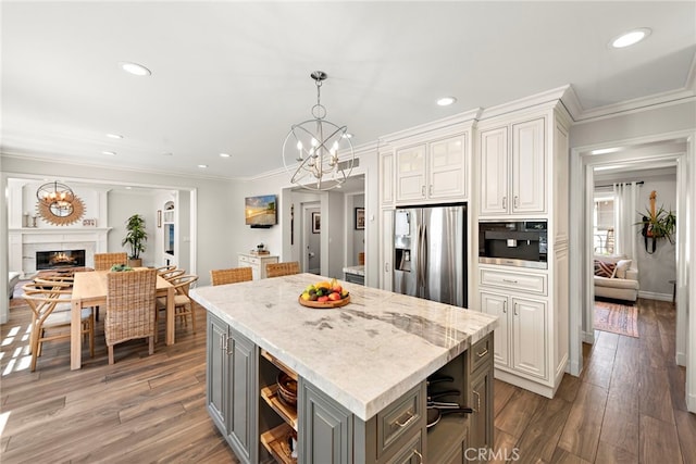 11 Markham Ln, Ladera Ranch, CA 92694 - kitchen featuring gray cabinetry, stainless steel fridge, a center island, recessed lighting, and wood finished floors