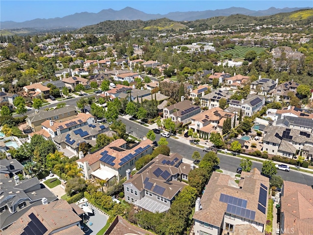 11 Markham Ln, Ladera Ranch, CA 92694 - aerial view of property's location with nearby suburban area and a mountainous background