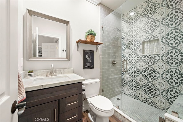 11 Markham Ln, Ladera Ranch, CA 92694 - full bathroom featuring a tile shower, toilet, and vanity
