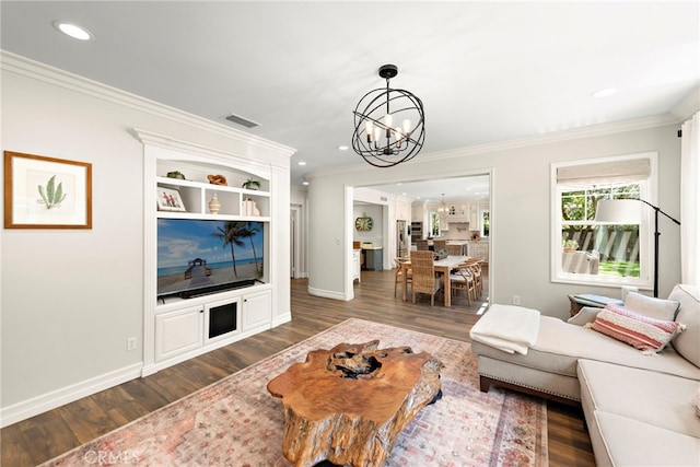11 Markham Ln, Ladera Ranch, CA 92694 - living room with a chandelier, ornamental molding, dark wood-type flooring, baseboards, and recessed lighting