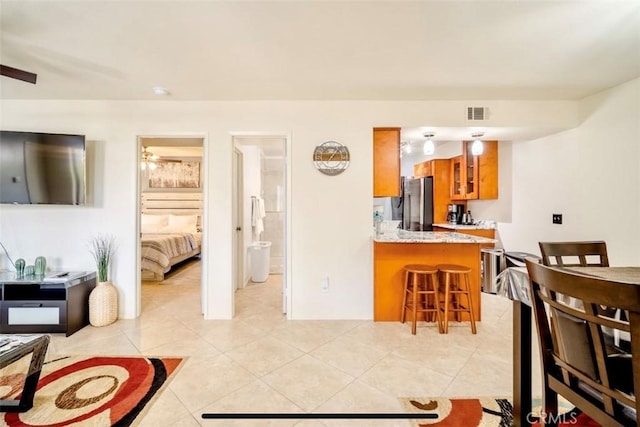 353 N Hermosa Dr Unit 7C1, Palm Springs, CA 92262 - living area featuring light tile patterned floors