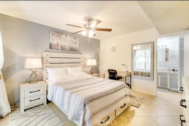353 N Hermosa Dr Unit 7C1, Palm Springs, CA 92262 - bedroom featuring a textured ceiling, light tile patterned floors, ensuite bathroom, and ceiling fan