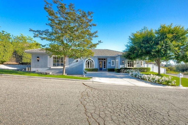 2507 Walinca Way, Vista, CA 92084 - view of front facade with stucco siding and concrete driveway