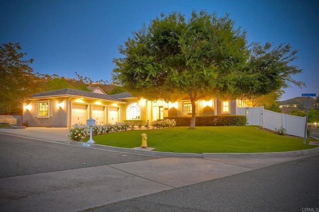2507 Walinca Way, Vista, CA 92084 - view of front of property with an attached garage, stucco siding, a gate, and driveway