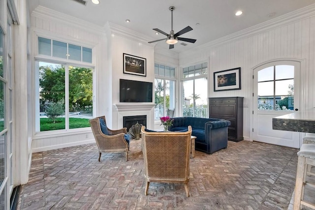 2507 Walinca Way, Vista, CA 92084 - living room featuring a fireplace, a ceiling fan, crown molding, brick floors, and recessed lighting