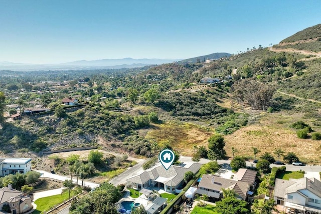 2507 Walinca Way, Vista, CA 92084 - aerial view of property and surrounding area with a mountain backdrop and nearby suburban area