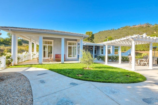 2507 Walinca Way, Vista, CA 92084 - rear view of property with a pergola, a lawn, stucco siding, and a patio