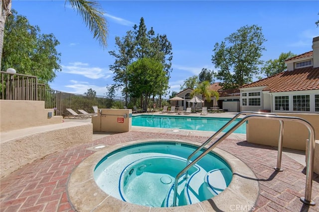 4240 Lost Hills Rd Unit 2102, Calabasas, CA 91301 - community pool featuring a patio area and a hot tub