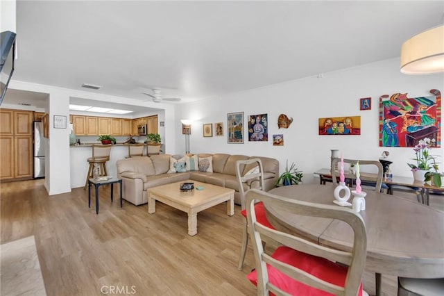 4240 Lost Hills Rd Unit 2102, Calabasas, CA 91301 - living area with ceiling fan and light wood finished floors