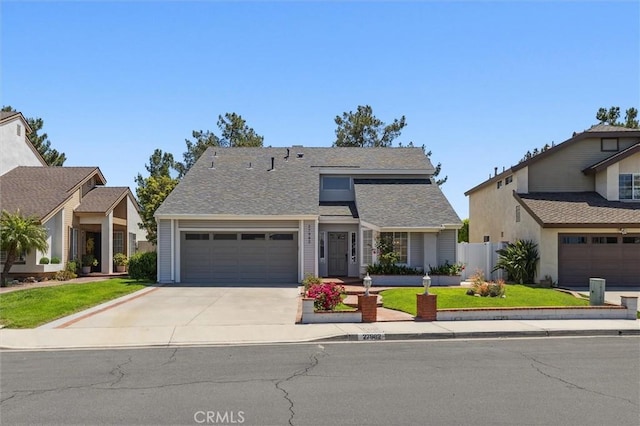 27982 Virginia, Mission Viejo, CA 92692 - view of front of property with driveway, an attached garage, and a shingled roof