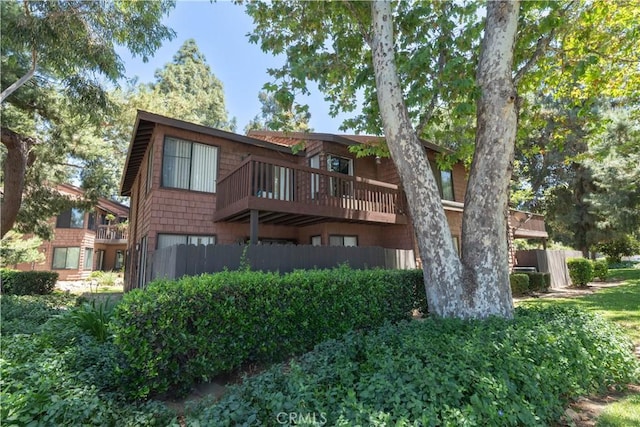 320 W Walnut St Unit 6, Ontario, CA 91762 - rear view of house featuring a balcony