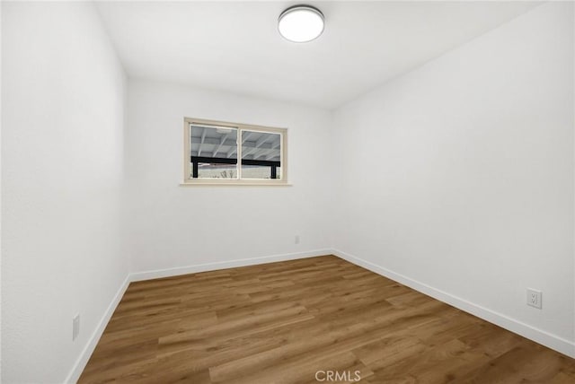 1292 Tiffany Pl, Tustin, CA 92780 - empty room with baseboards and wood finished floors