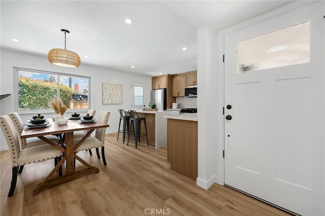 1292 Tiffany Pl, Tustin, CA 92780 - dining space featuring recessed lighting, light wood finished floors, and baseboards