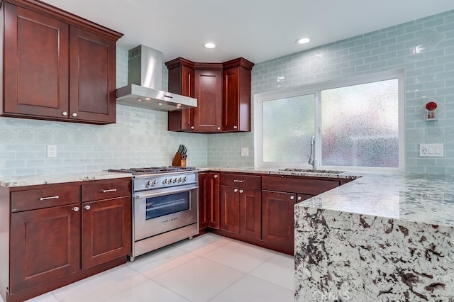 2600 Brynwood Pl, West Covina, CA 91792 - kitchen with high end stove, wall chimney exhaust hood, a sink, light stone countertops, and recessed lighting