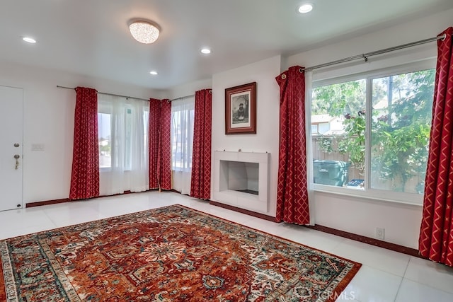 2600 Brynwood Pl, West Covina, CA 91792 - unfurnished living room with recessed lighting, baseboards, and tile patterned floors
