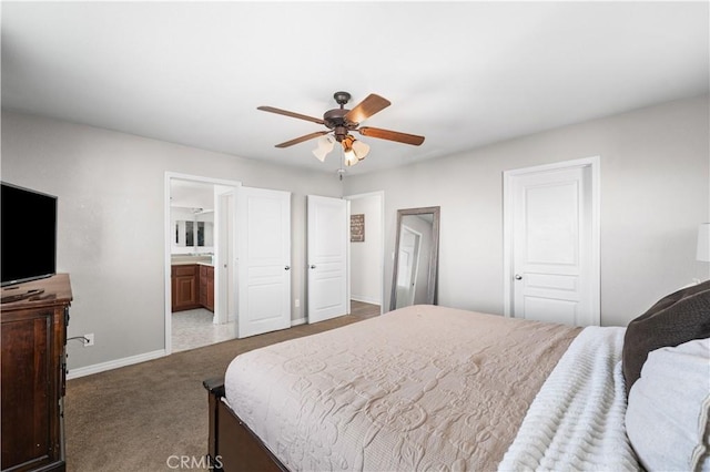 3116 Perdot Ave, Rosamond, CA 93560 - bedroom with baseboards, carpet, ceiling fan, and connected bathroom