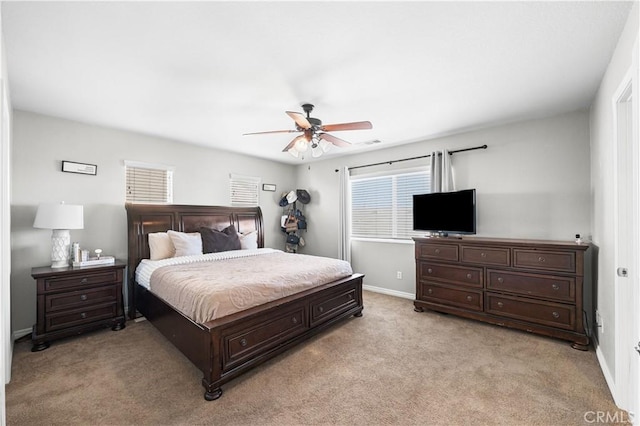 3116 Perdot Ave, Rosamond, CA 93560 - bedroom featuring light colored carpet, baseboards, and a ceiling fan
