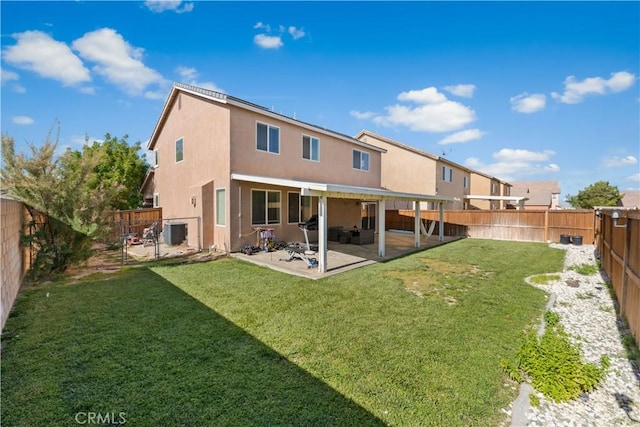 3116 Perdot Ave, Rosamond, CA 93560 - rear view of house featuring stucco siding, a patio, and cooling unit