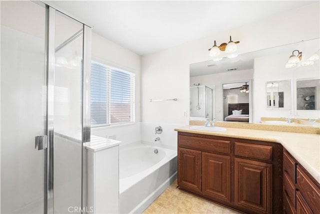 3116 Perdot Ave, Rosamond, CA 93560 - bathroom with a stall shower, double vanity, a bath, ensuite bath, and ceiling fan