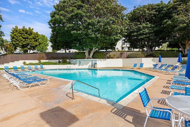 2284 Caminito Pajarito Unit 147, San Diego, CA 92107 - community pool featuring a patio