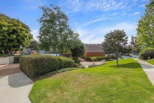 2284 Caminito Pajarito Unit 147, San Diego, CA 92107 - view of front of home with a front lawn