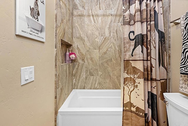 2284 Caminito Pajarito Unit 147, San Diego, CA 92107 - bathroom featuring toilet, shower / bathtub combination with curtain, and a textured wall