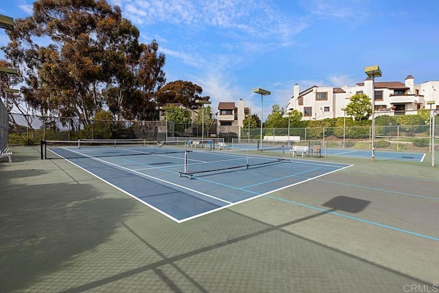 2284 Caminito Pajarito Unit 147, San Diego, CA 92107 - view of tennis court featuring community basketball court and a residential view