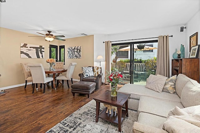 2284 Caminito Pajarito Unit 147, San Diego, CA 92107 - living area with wood finished floors, a ceiling fan, and baseboards