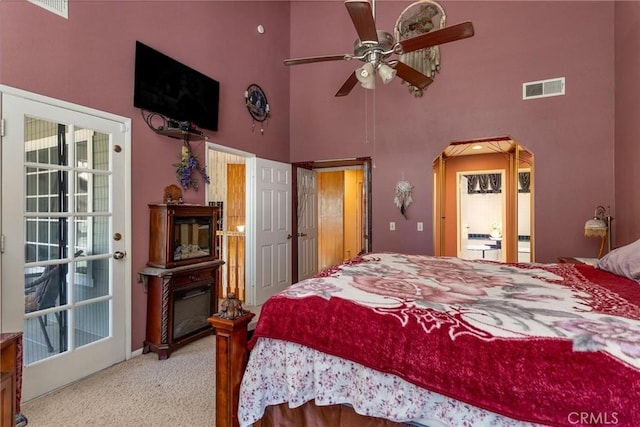1290 3rd, Calimesa, CA 92320 - bedroom with a towering ceiling, carpet floors, and arched walkways