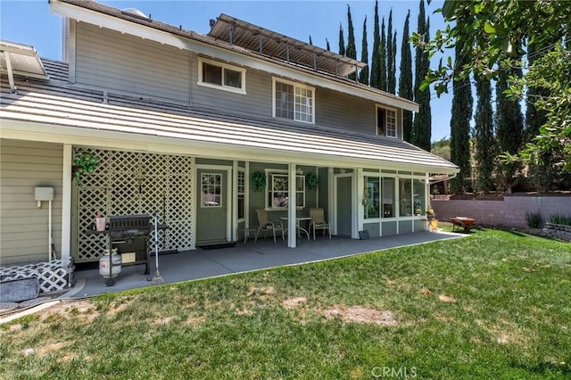 1290 3rd, Calimesa, CA 92320 - back of property with a patio and a yard