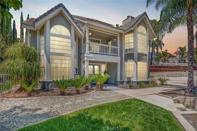 1290 3rd, Calimesa, CA 92320 - view of front facade with a balcony