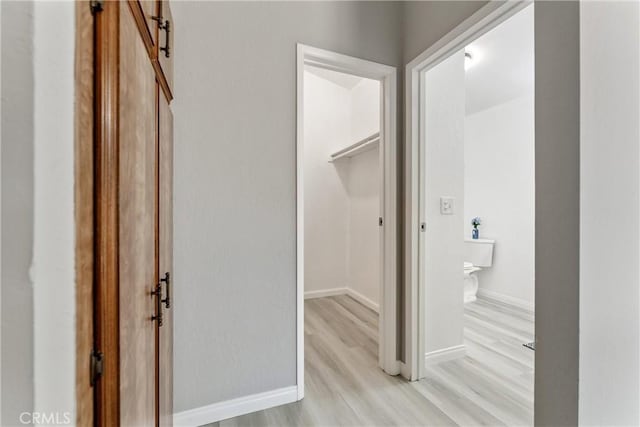 43638 Oleander St, Lancaster, CA 93535 - hallway featuring light wood-style flooring and baseboards