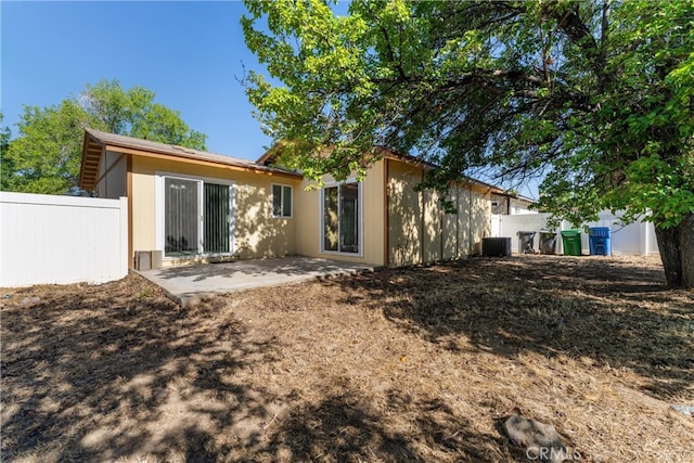 43638 Oleander St, Lancaster, CA 93535 - back of property with a patio area and cooling unit