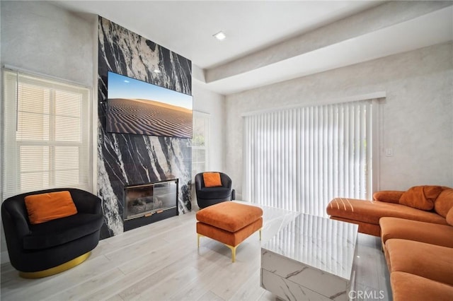10659 Bloomfield St, Toluca Lake, CA 91602 - living area with a fireplace and wood finished floors