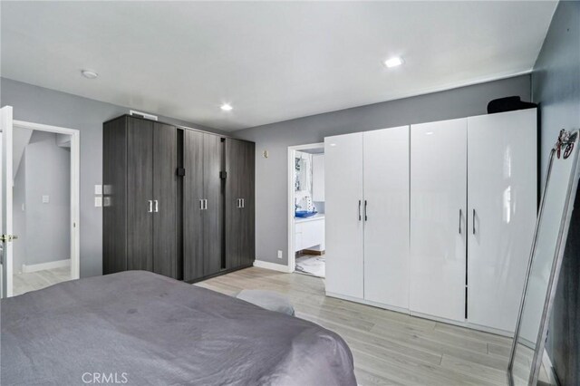 10659 Bloomfield St, Toluca Lake, CA 91602 - bedroom featuring light wood-type flooring, baseboards, recessed lighting, and ensuite bathroom