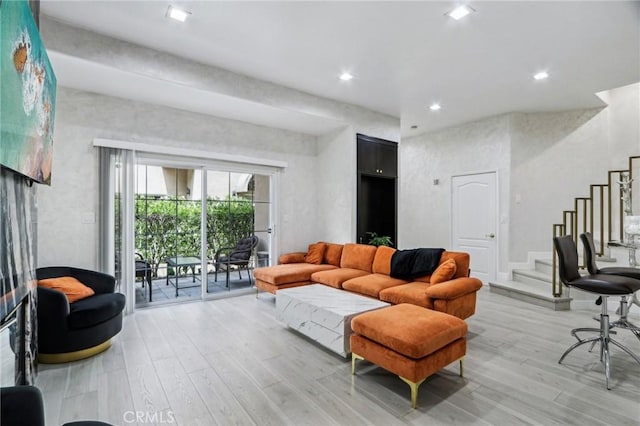 10659 Bloomfield St, Toluca Lake, CA 91602 - living room with light wood finished floors, stairs, and recessed lighting