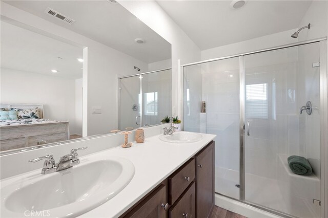 30769 Impala Ct, Winchester, CA 92596 - bathroom with a stall shower and double vanity