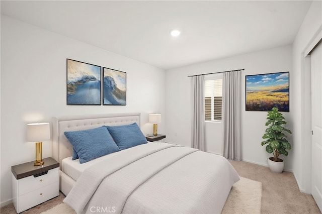 30769 Impala Ct, Winchester, CA 92596 - bedroom featuring light carpet, baseboards, and a closet