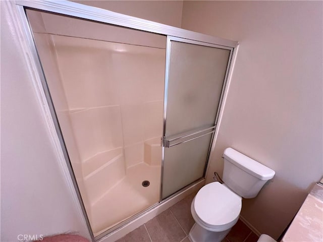 1509 E 23rd St Unit A, Signal Hill, CA 90755 - bathroom featuring a stall shower, tile patterned floors, and toilet