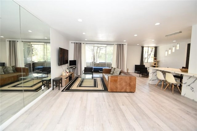7309 Franklin Ave Unit 105, Los Angeles, CA 90046 - living area featuring wood finished floors, recessed lighting, and plenty of natural light