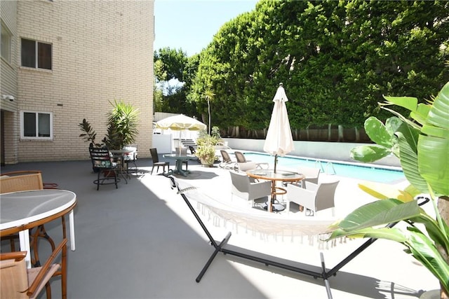 7309 Franklin Ave Unit 105, Los Angeles, CA 90046 - view of patio featuring outdoor dining space