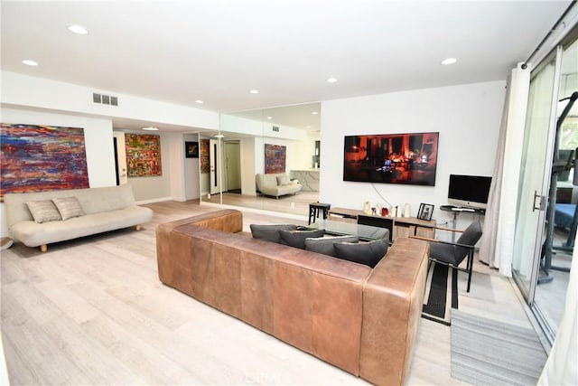 7309 Franklin Ave Unit 105, Los Angeles, CA 90046 - living room with light wood-style floors and recessed lighting