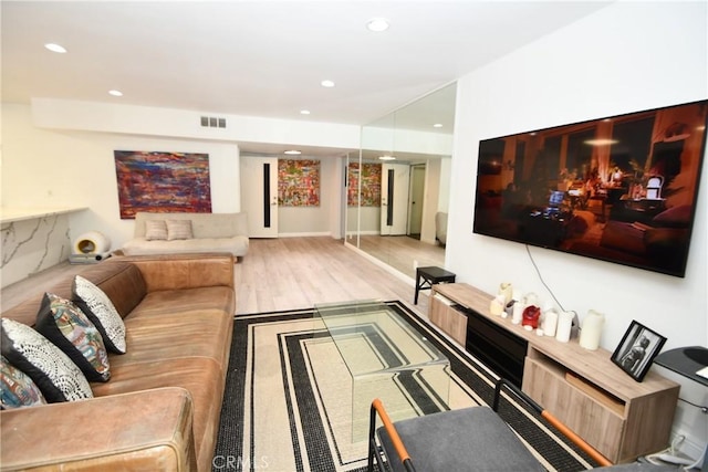 7309 Franklin Ave Unit 105, Los Angeles, CA 90046 - living room with recessed lighting and wood finished floors