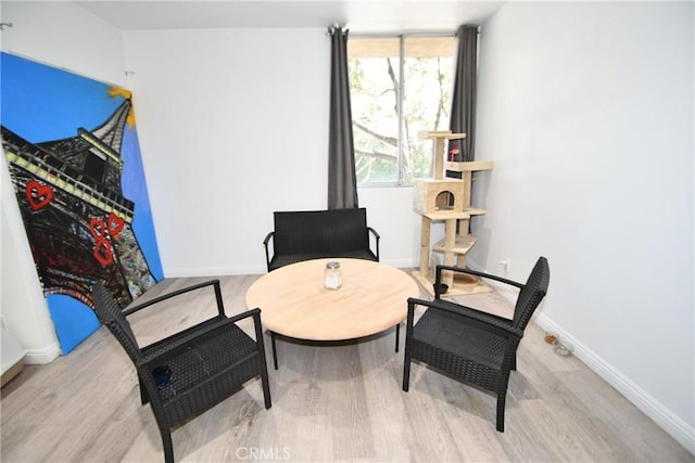 7309 Franklin Ave Unit 105, Los Angeles, CA 90046 - living area with wood finished floors and baseboards