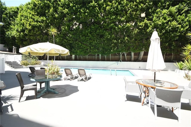 7309 Franklin Ave Unit 105, Los Angeles, CA 90046 - view of swimming pool with a patio